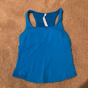 Lululemon bright blue instill tank with built in sports bra.